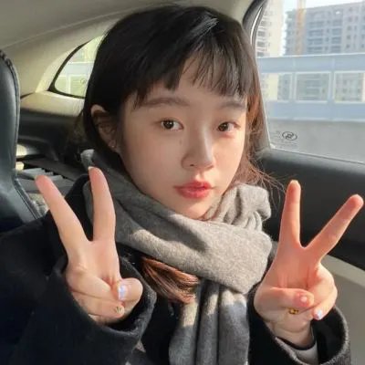 桃花含露又春风